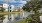 a body of water with buildings around it