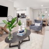 living room with a tv couch and coffee table