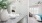 a bathroom with a large marble countertop